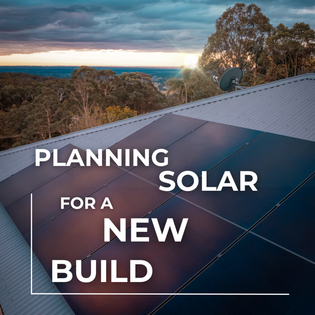 Solar panels at sunset with text over them.