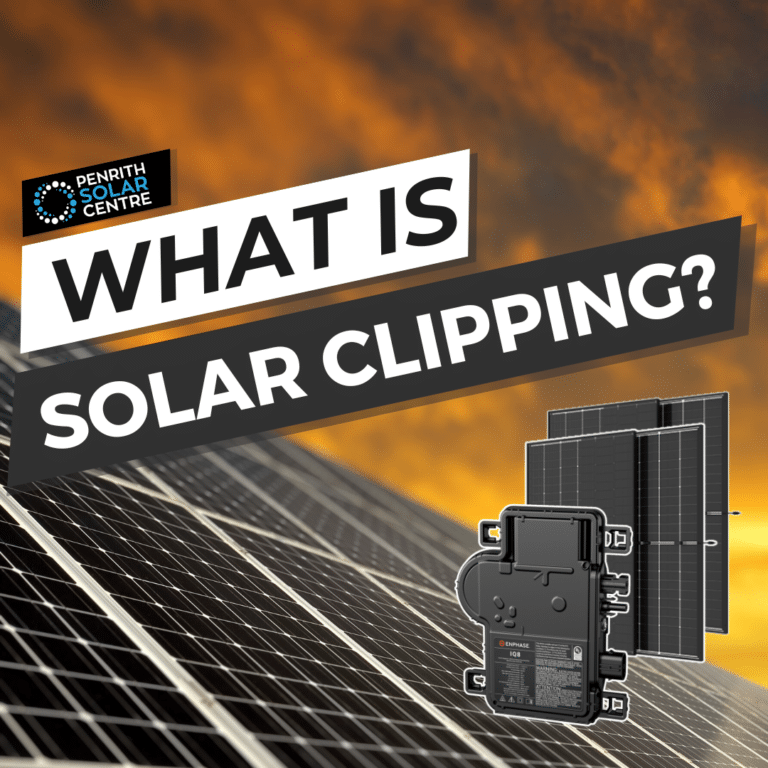 Solar panels with a sunset sky.